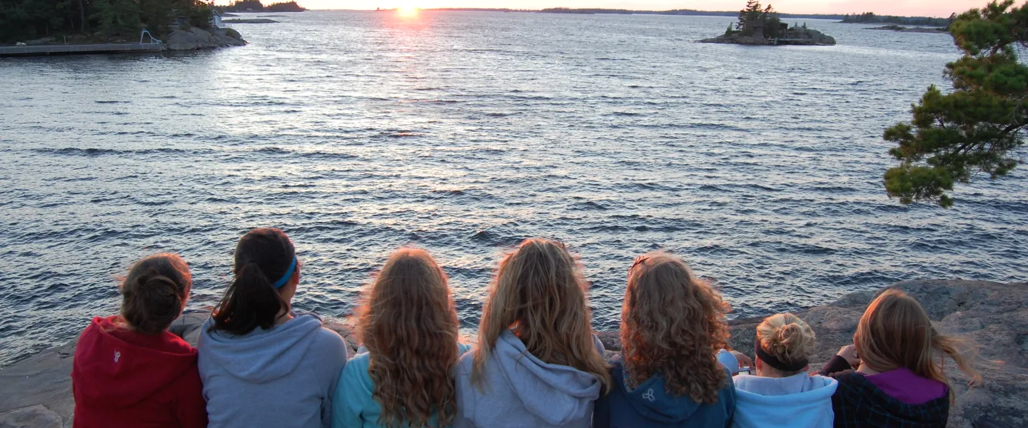 Group of campers looking out at the water at CQE