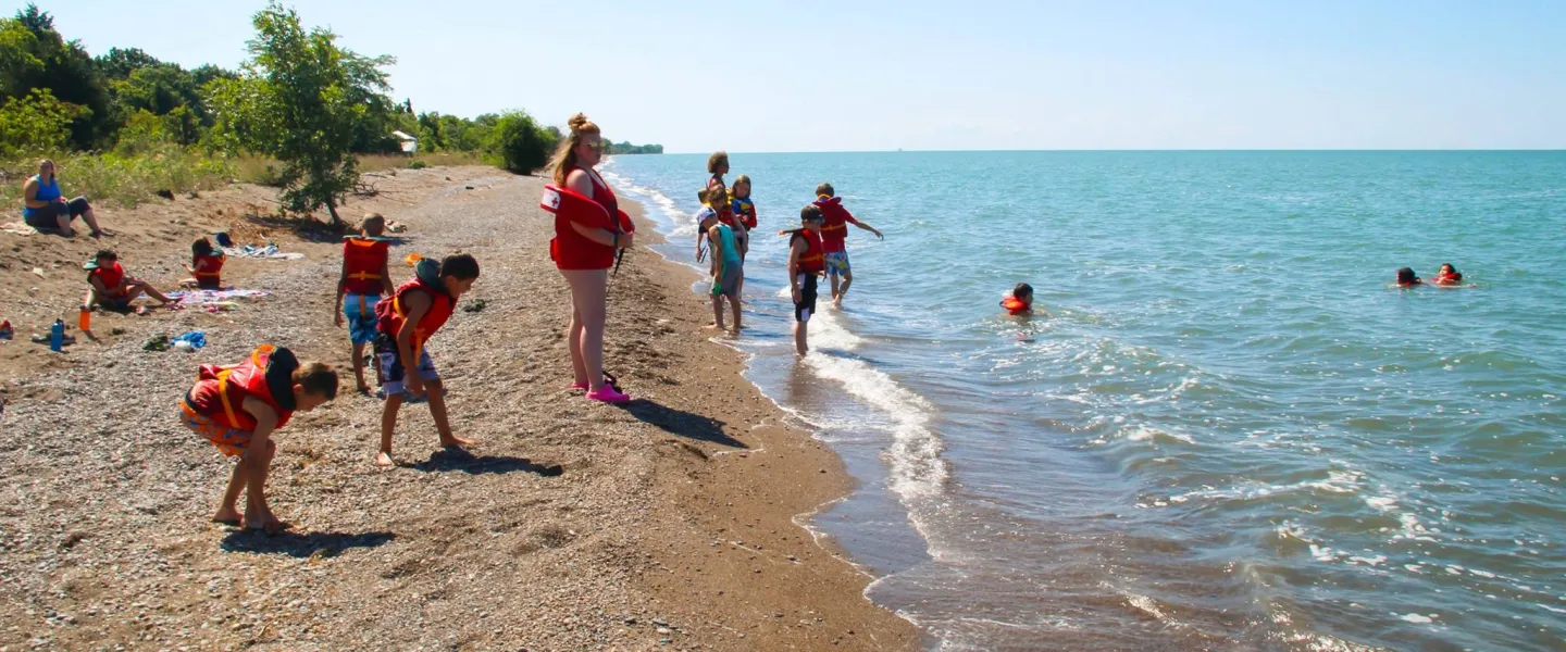 kids at the beach at Camp Henry