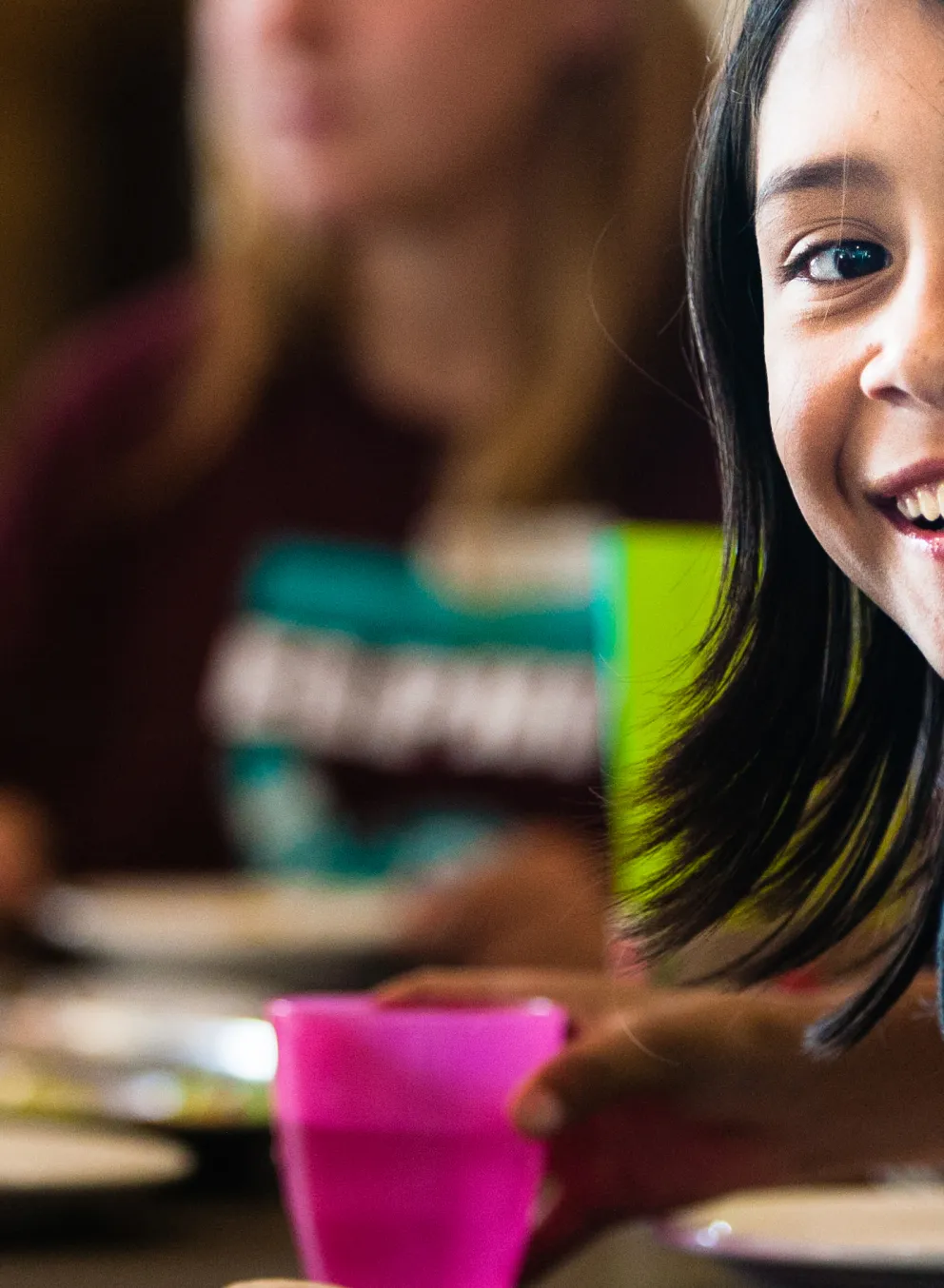 Kids eating snacks at a table