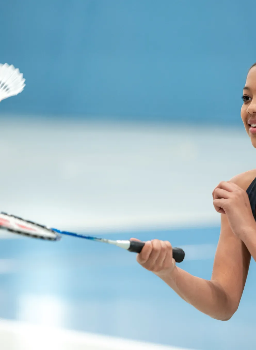 Girl playing badminton