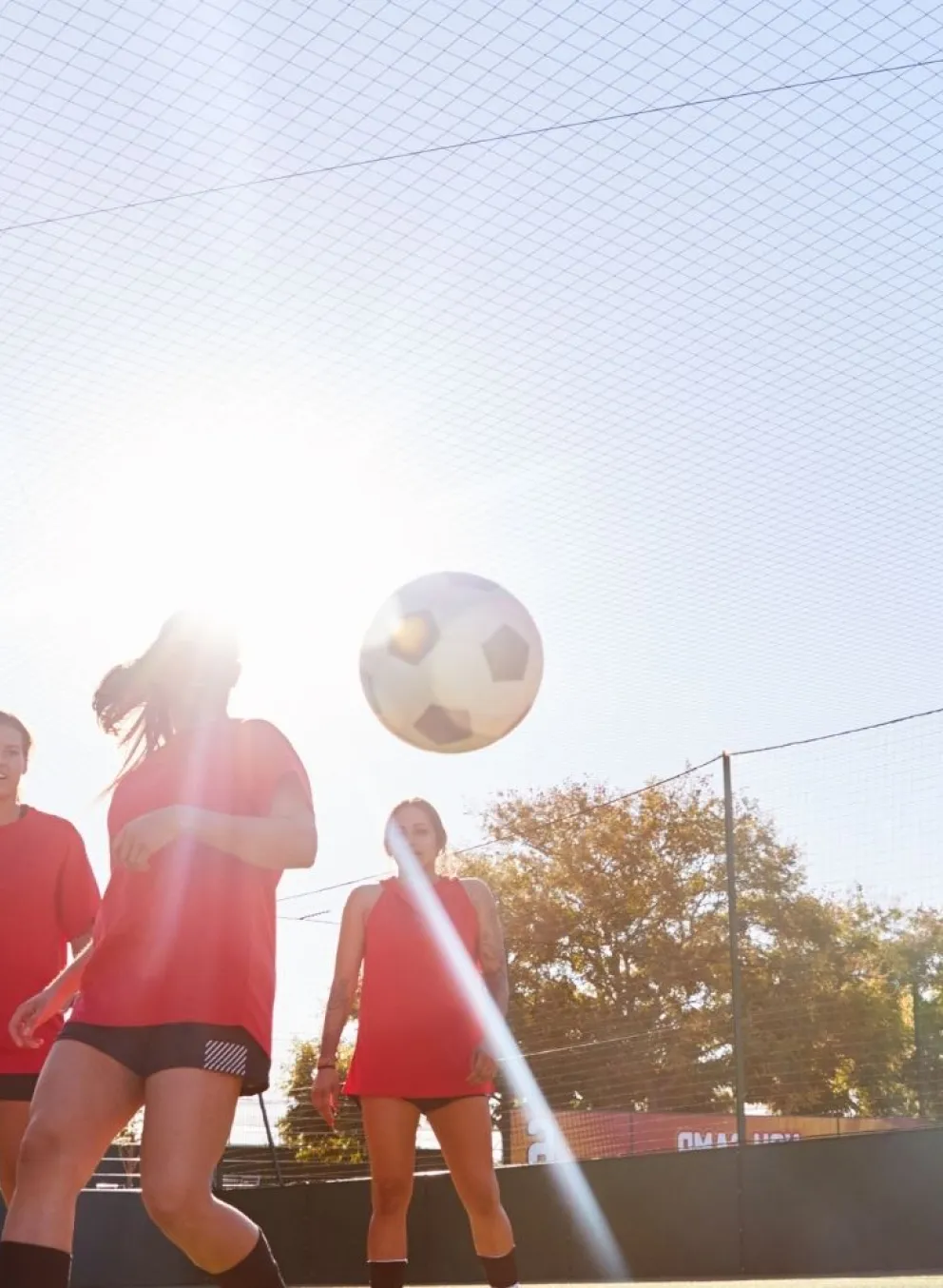 Women playing soccer