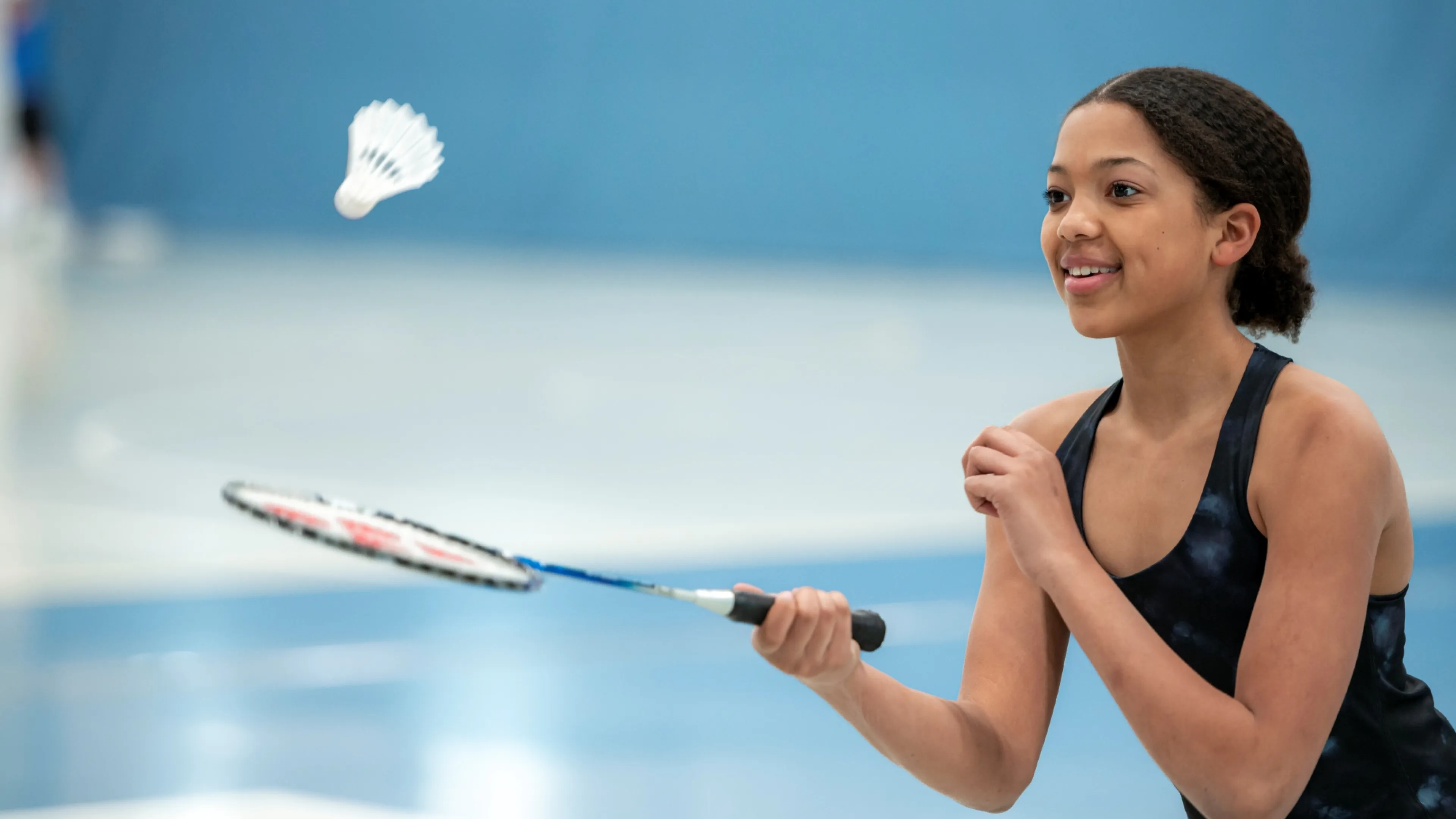 Girl playing badminton