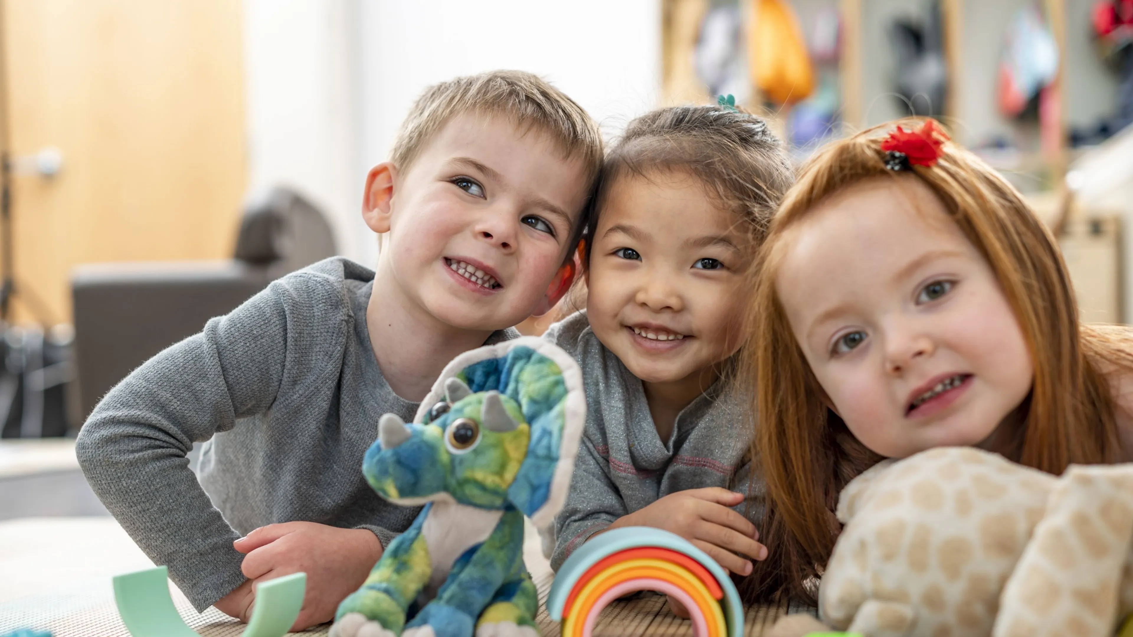 Three kids at YMCA Child Care