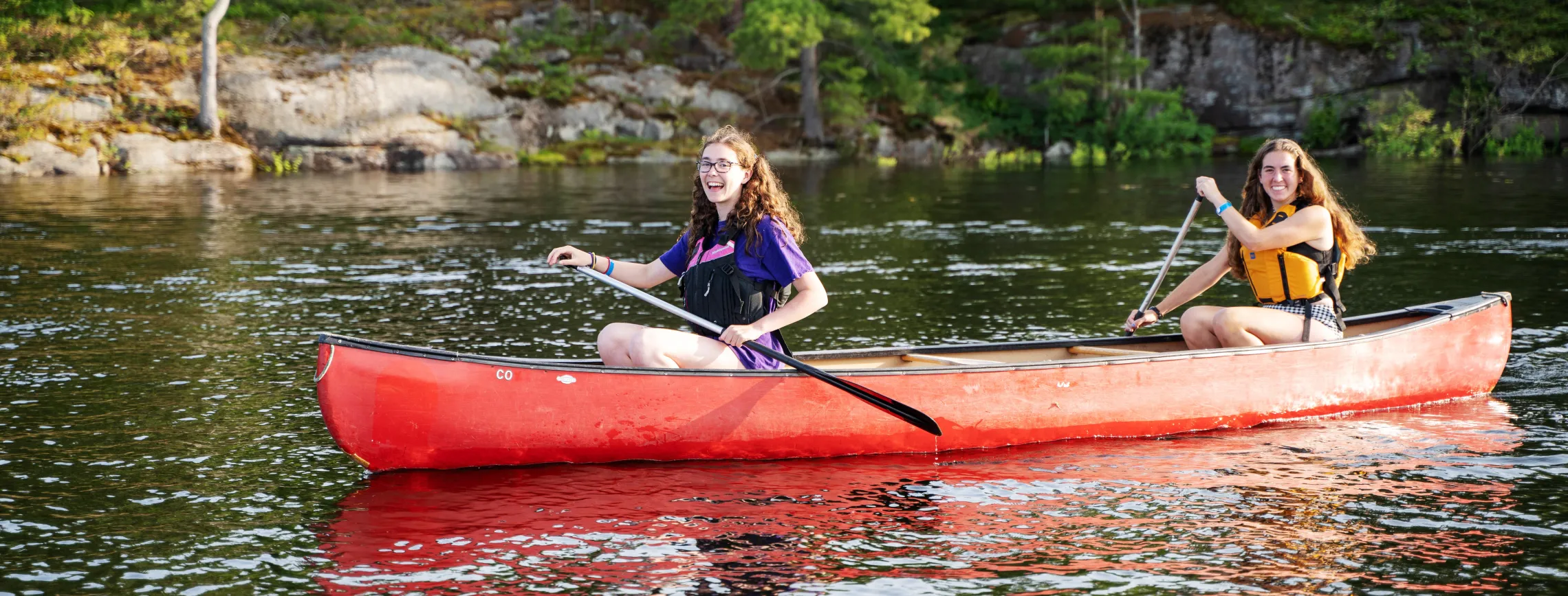 Girls canoeing at CQE