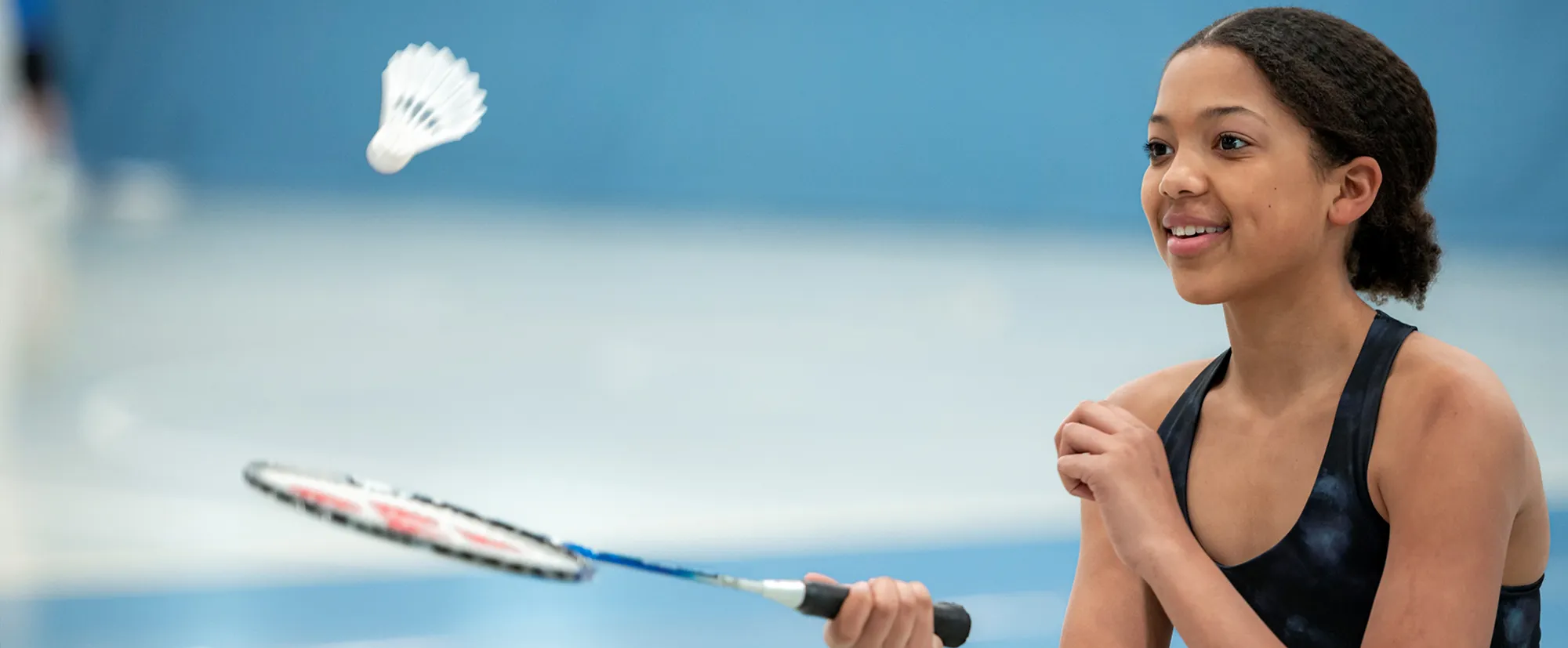 Girl playing badminton