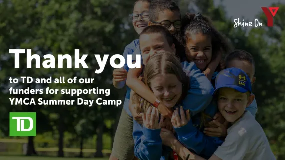 Campers hugging wtih Thank you and TD logo