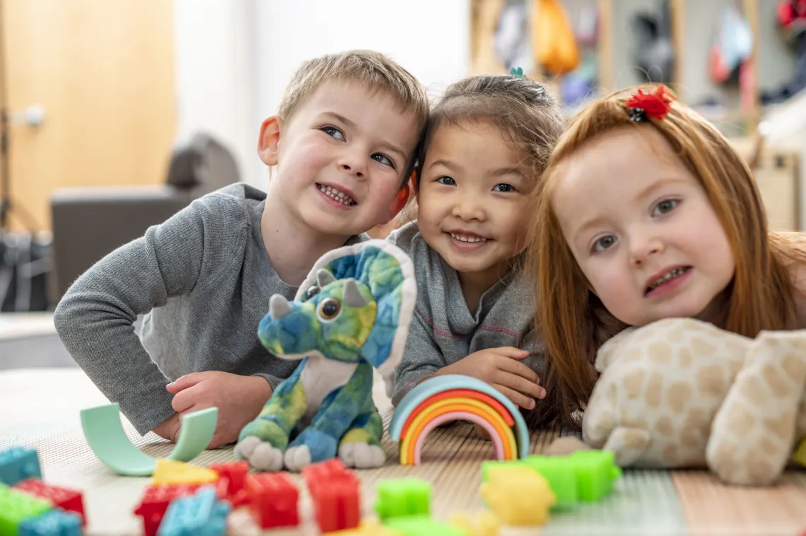 Three kids at YMCA Child Care
