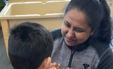 Educator with child